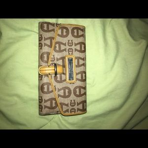 Erie news Aigner wallet